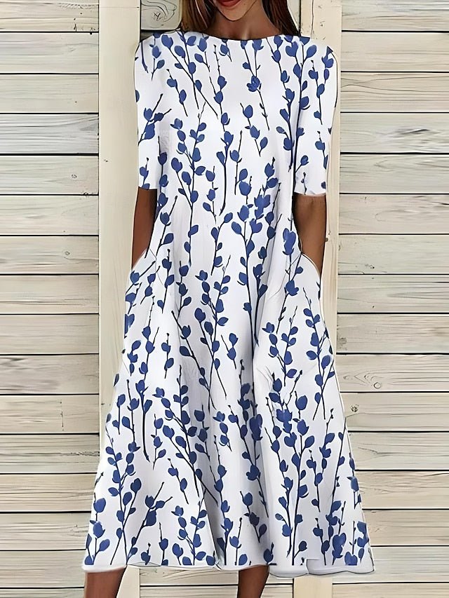 Women’s A-Line mid-length summer dress featuring a vibrant floral print, perfect for casual outings and warm weather occasions. 0
